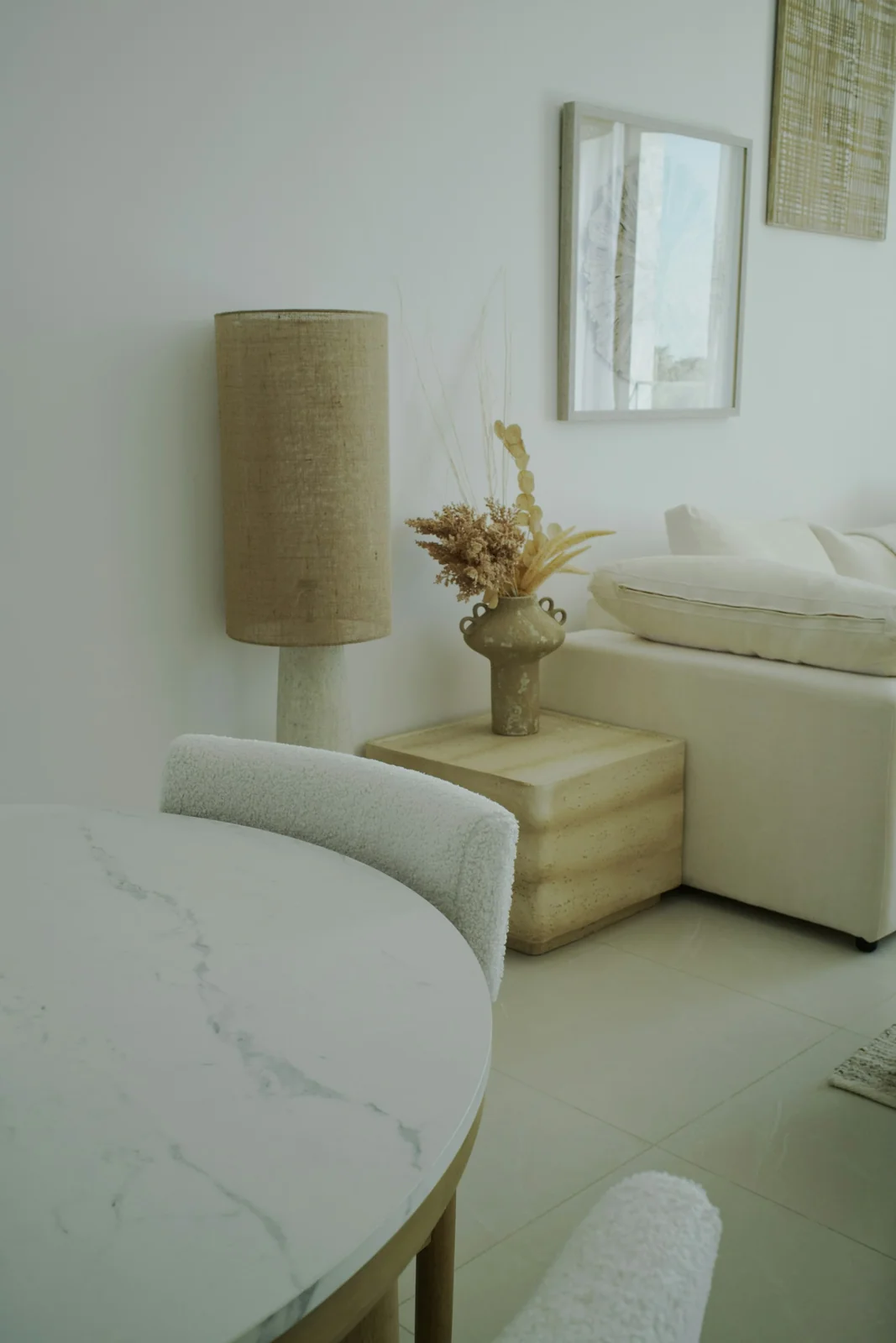 Warm, softly lit interior with sculptural furniture
